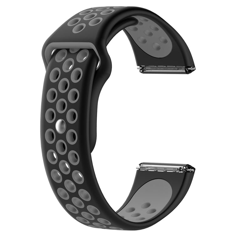 Black and gray two-tone silicone watchband with oval cutout pattern and snap clasp.