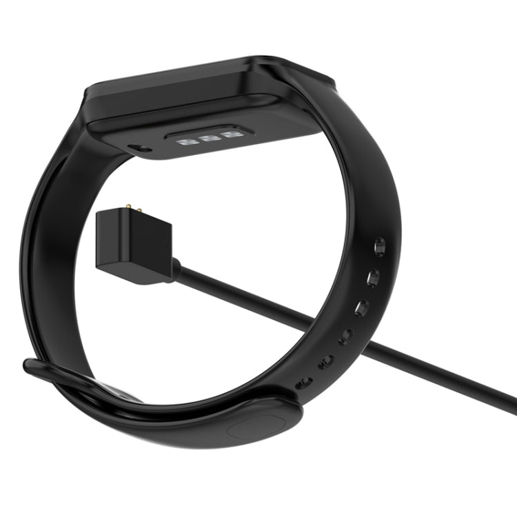 Black smartwatch band with magnetic charging connector and USB cable