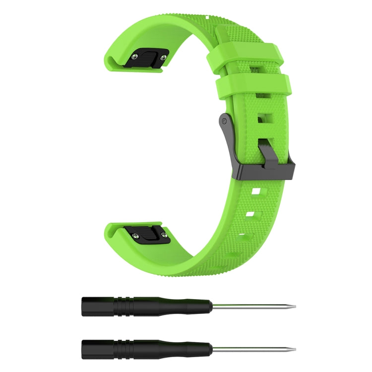 Lime green silicone replacement watch strap with quick-release buckle and pin tools