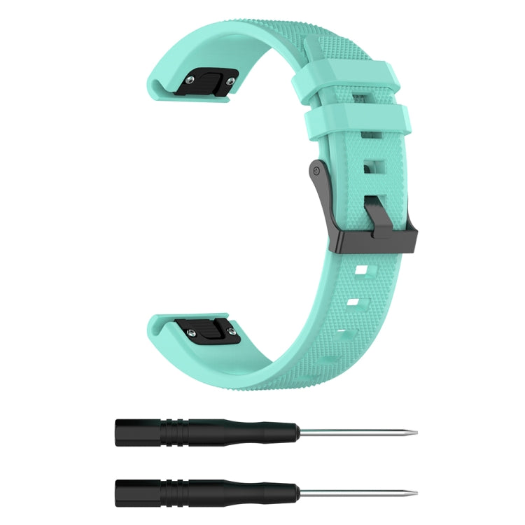 Mint green silicone replacement watch strap with quick-release buckle and pin tools