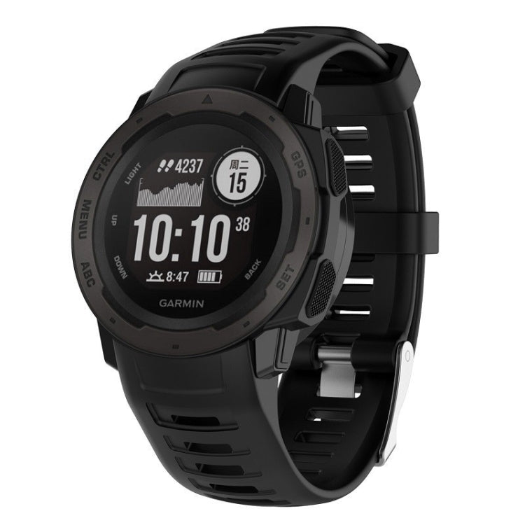 Black silicone replacement watch strap with metal buckle and textured strap links