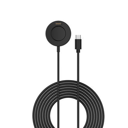 Black circular watch charging dock with USB-C plug and coiled cable