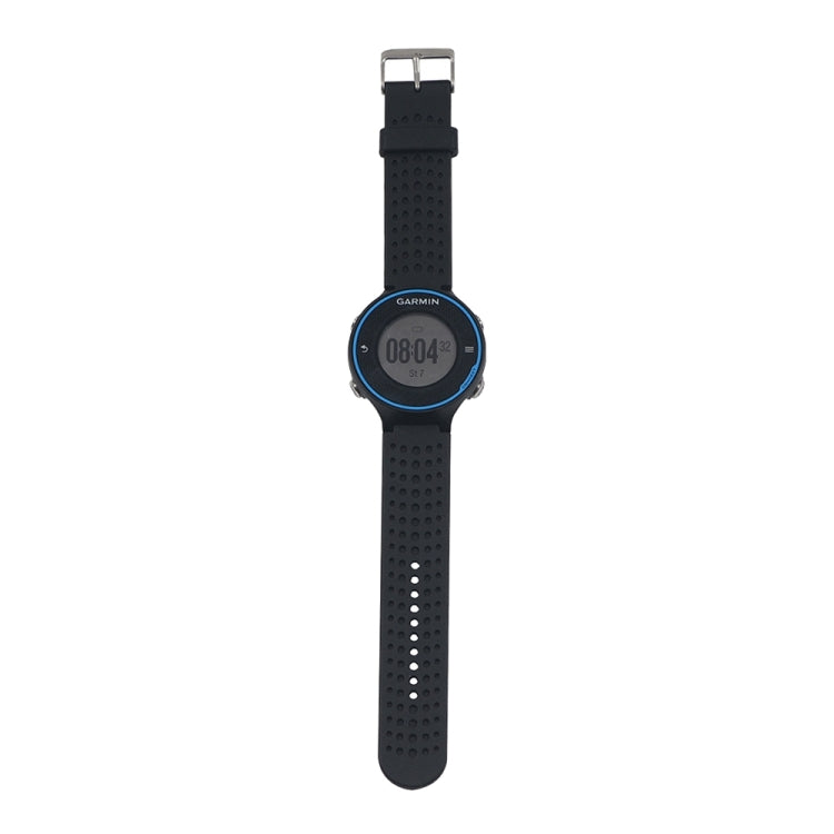 Black perforated silicone watch strap with metal buckle, on Garmin watch