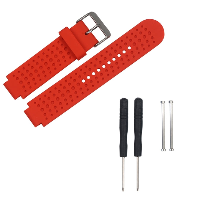 Red perforated silicone watch strap with metal buckle and adjustment holes, plus pins