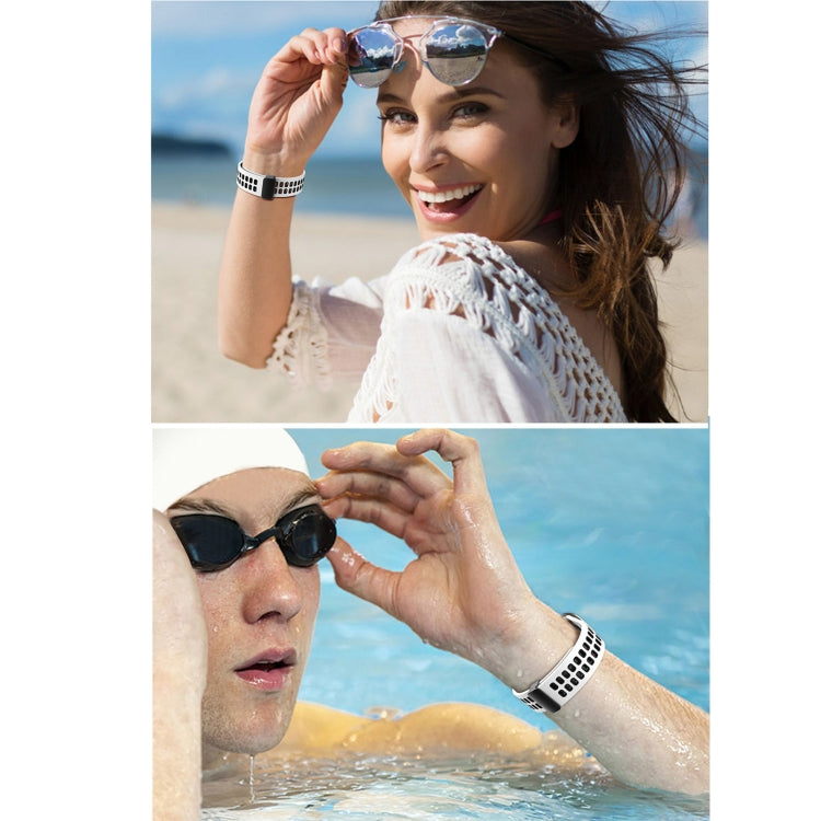 People wearing a white silicone perforated watch band on their wrist outdoors