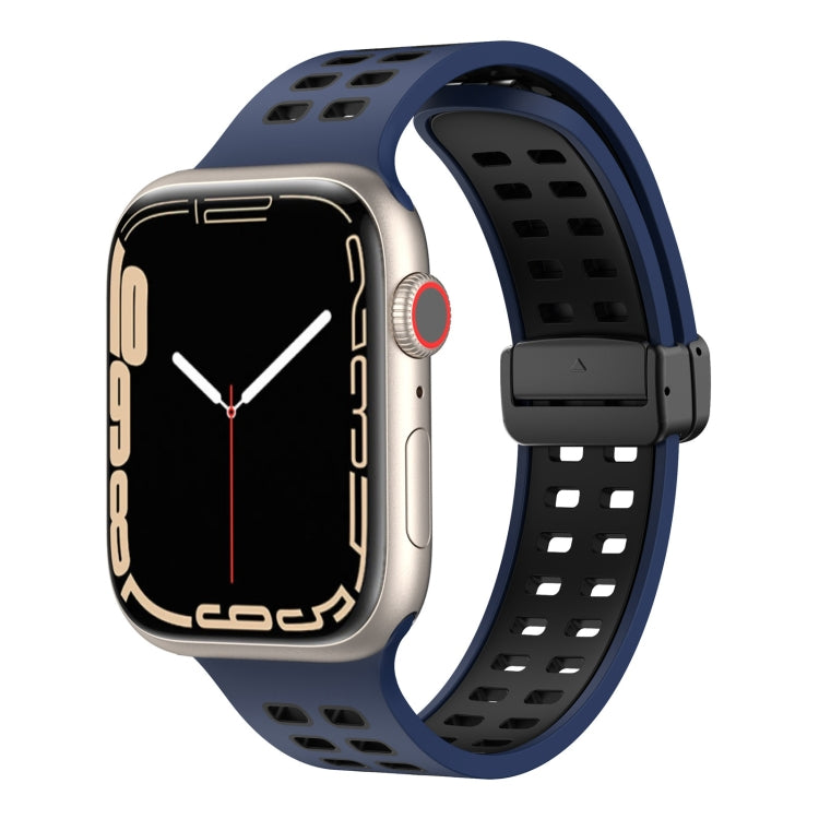 Blue silicone smartwatch band with square cutouts and magnetic fold clasp detail