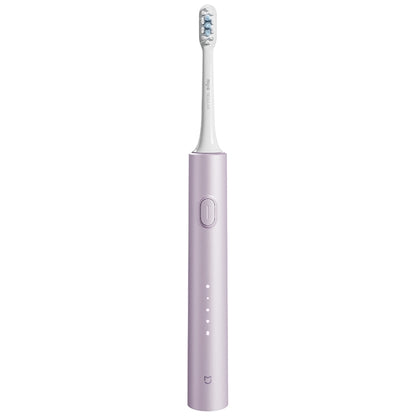 Purple electric toothbrush with small round power button on handle.