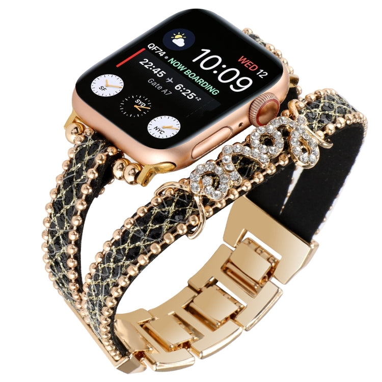 Leather chain watch band with black leather strap, gold-tone links, rhinestone charm