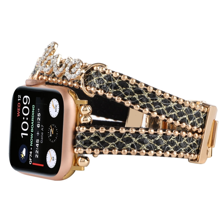 Leather chain watch band with black leather strap, gold buckle, layered chain and rhinestones