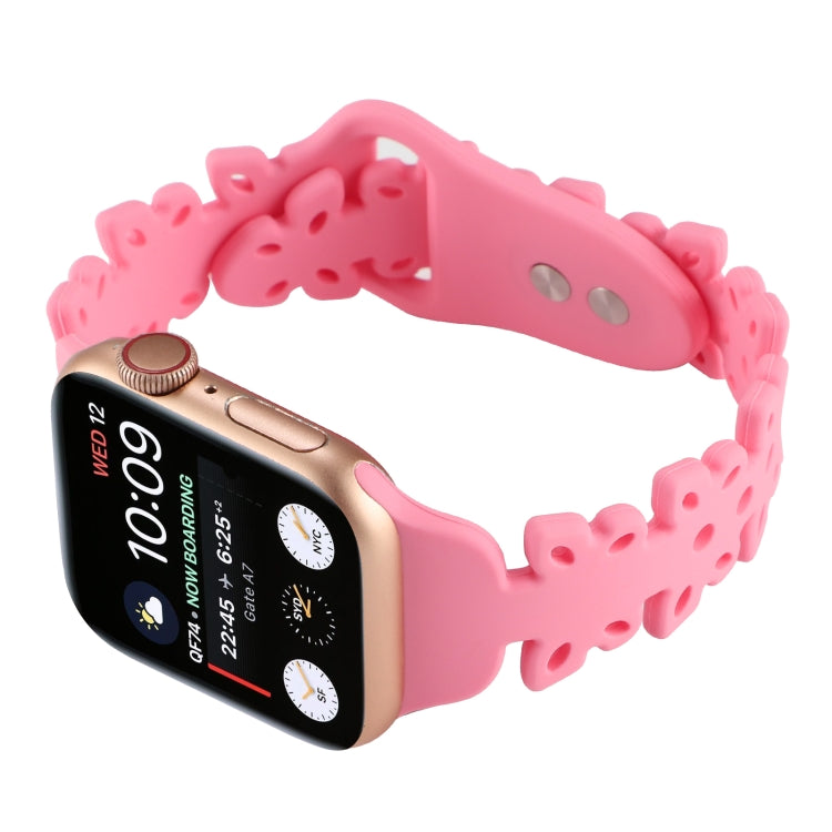 Pink butterfly hollow silicone watch band on Apple Watch, side view of clasp.