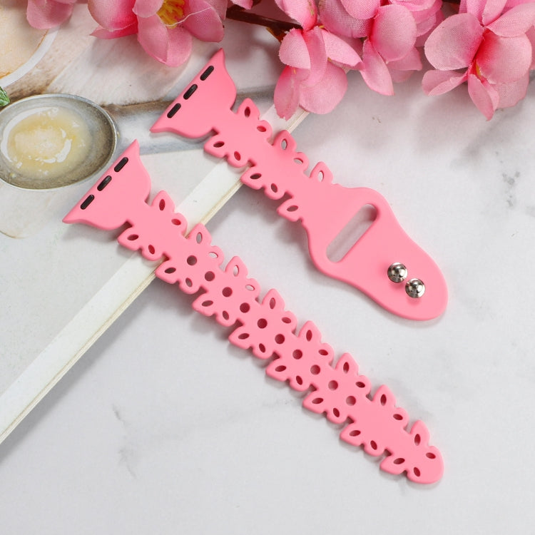 Pink butterfly hollow silicone watch band with cutout butterfly pattern and metal pin holes.