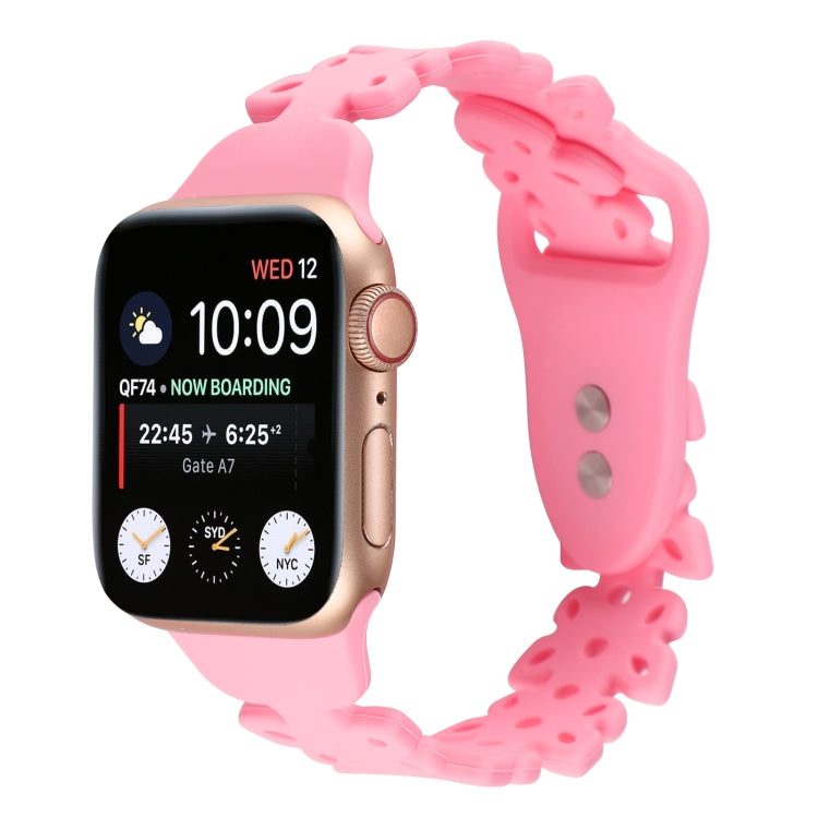 Pink butterfly hollow silicone watch band on Apple Watch with butterfly cutout links.