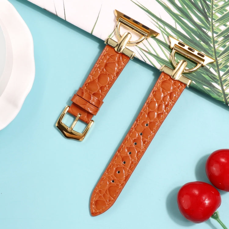 Orange crocodile-embossed genuine leather watch bands with gold-tone D-buckle, pair shown