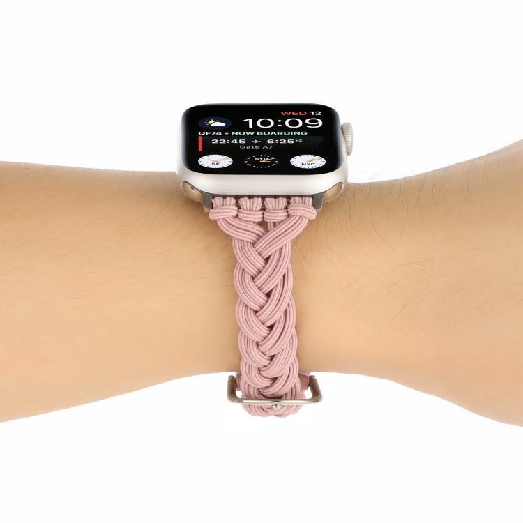 Apple Watch braided nylon elastic band, blush pink on wrist with metal buckle