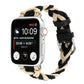 Two-tone braided elastic nylon Apple Watch band with black and beige sections