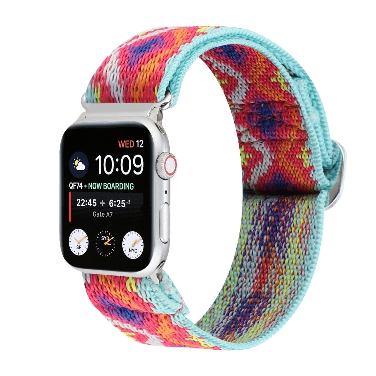 Elastic nylon watch band for Apple Watch, light blue edge with pink and blue multicolor woven design.