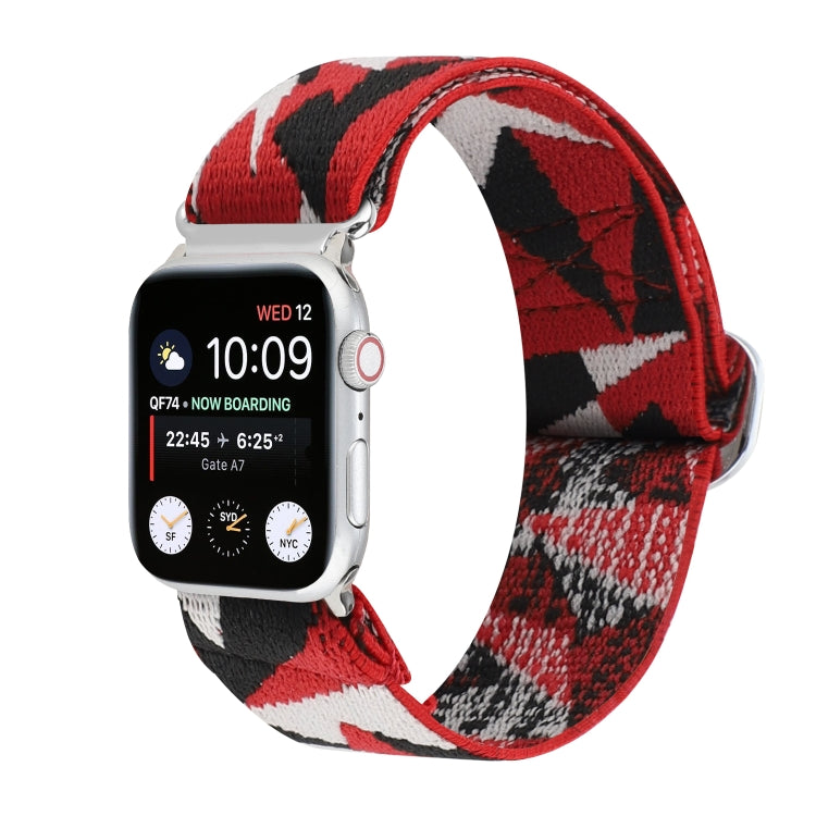 Elastic nylon watch band with plaid pattern in red, black, and white; metal buckle.