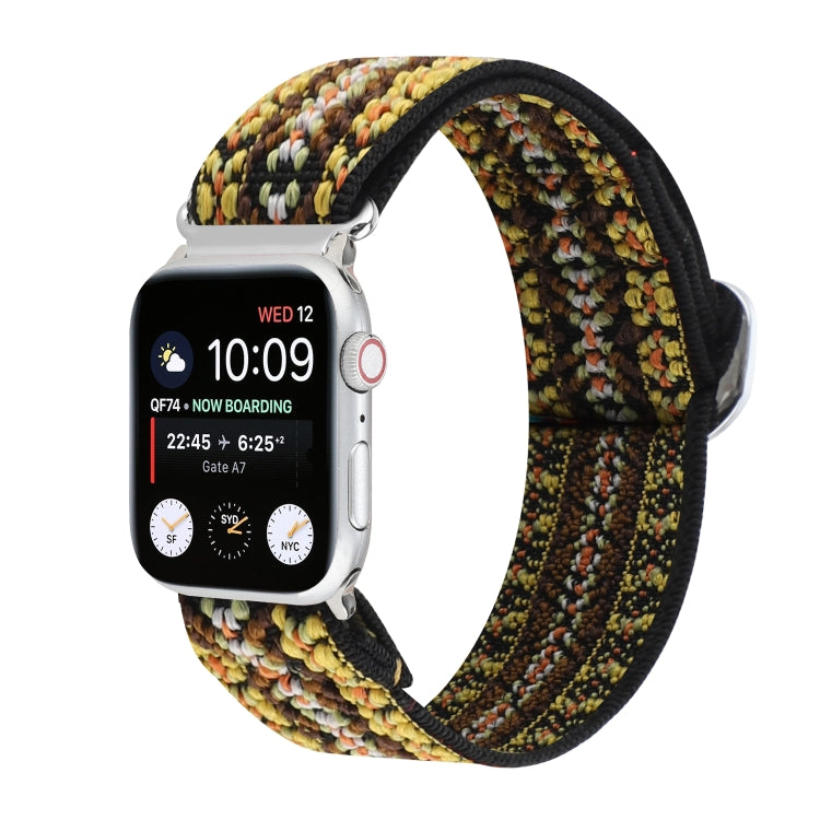 Elastic nylon watch band with multicolor textured pattern; metal buckle.