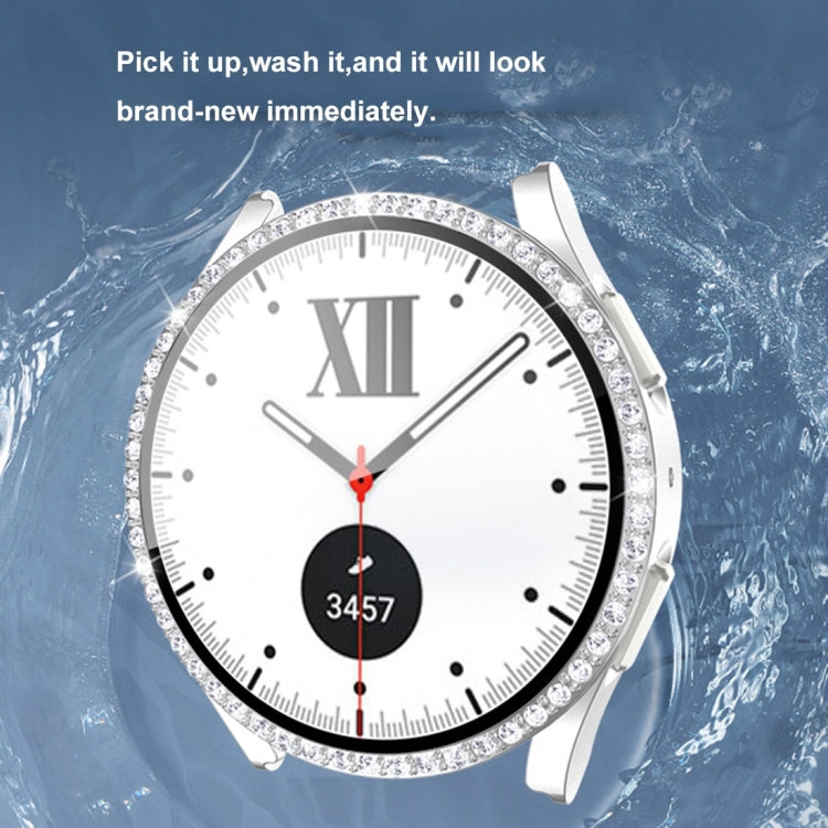 Round diamond watch case with tempered glass, sparkling bezel and white strap