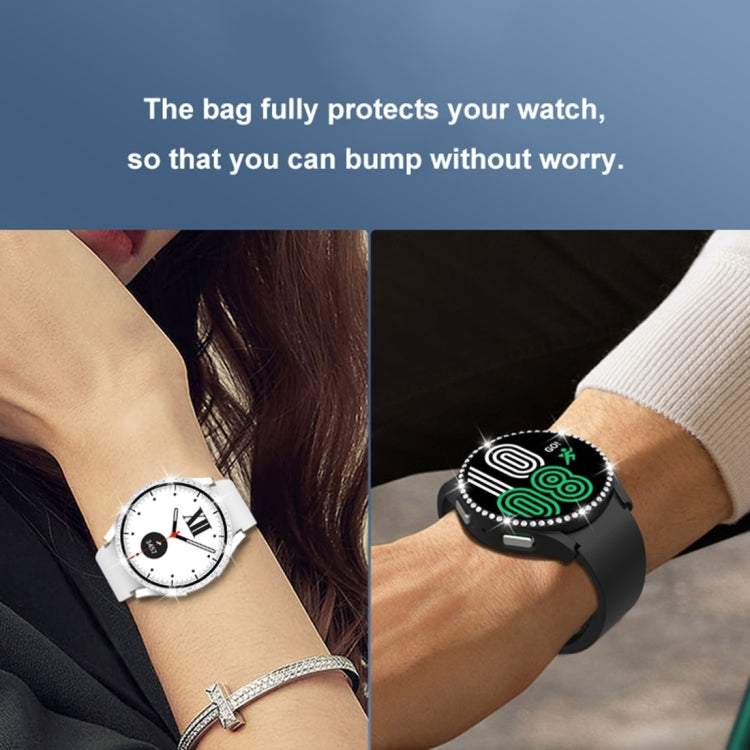 Diamond watch case with tempered glass on wrist, black bezel with green accents