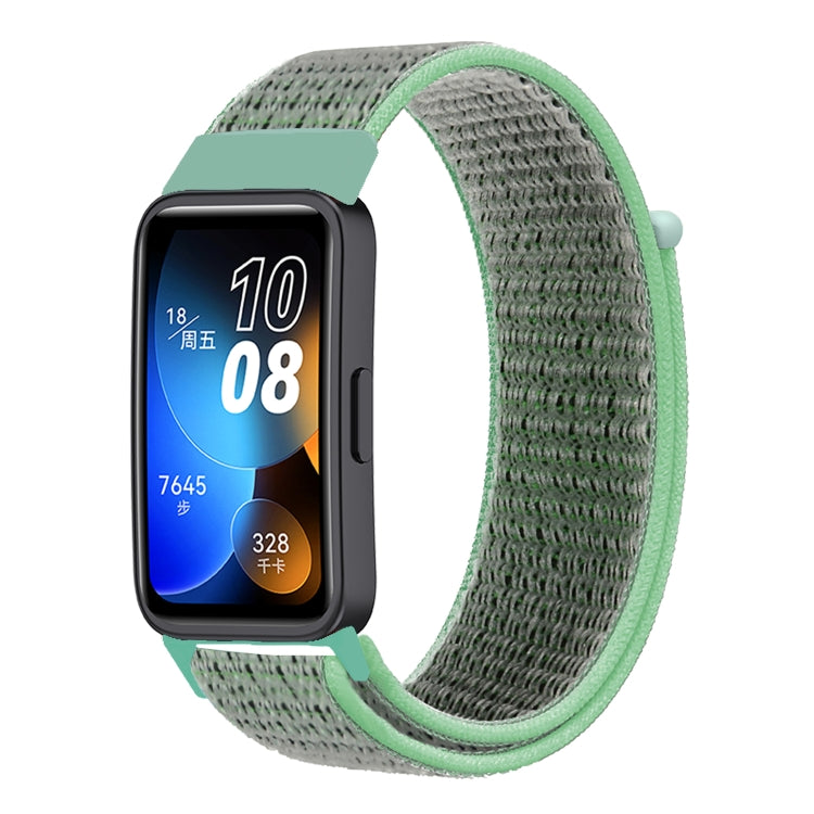 Woven nylon loop watch band with dark green woven strap and mint green end tabs