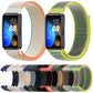 Woven nylon loop watch band set with beige, orange, and green woven straps and end tabs