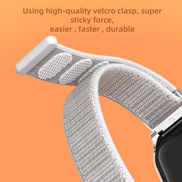 Light gray nylon strap with hook-and-loop closure and metal watch shell