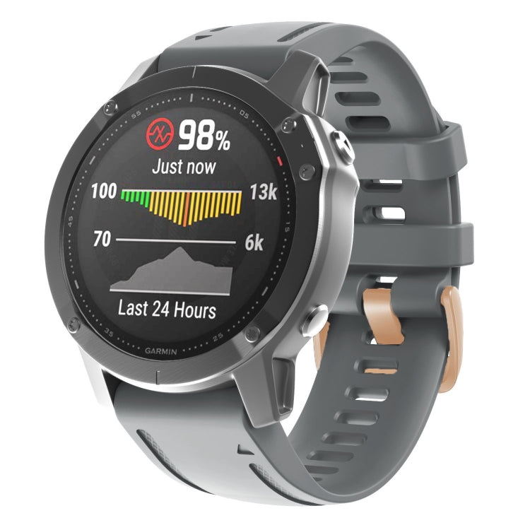 Gray silicone watch band with rose-gold buckle and adjustable holes