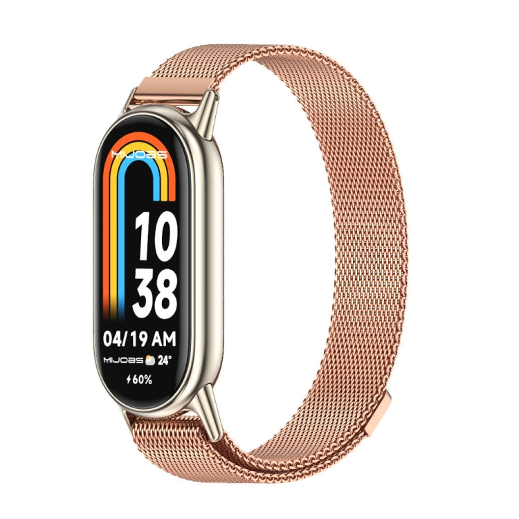 Rose-gold magnetic metal watch band with mesh links, shown with smartwatch display