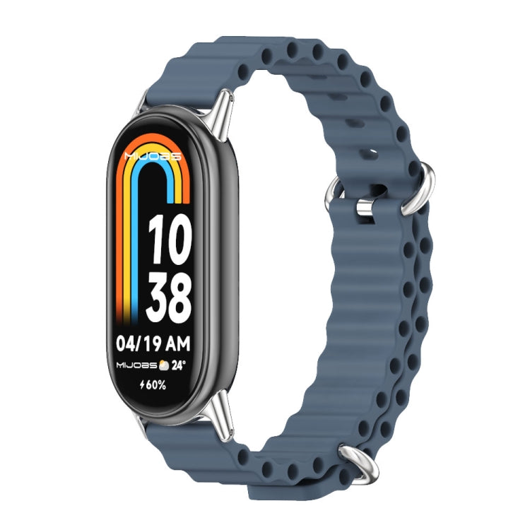 Blue breathable silicone watch band with metal clasp and perforations for Xiaomi Smart Band