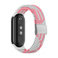 Pink and white braided nylon watch band with adjustable steel buckle and silver clasp