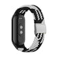 Black and white braided nylon watch band with adjustable steel buckle and silver clasp