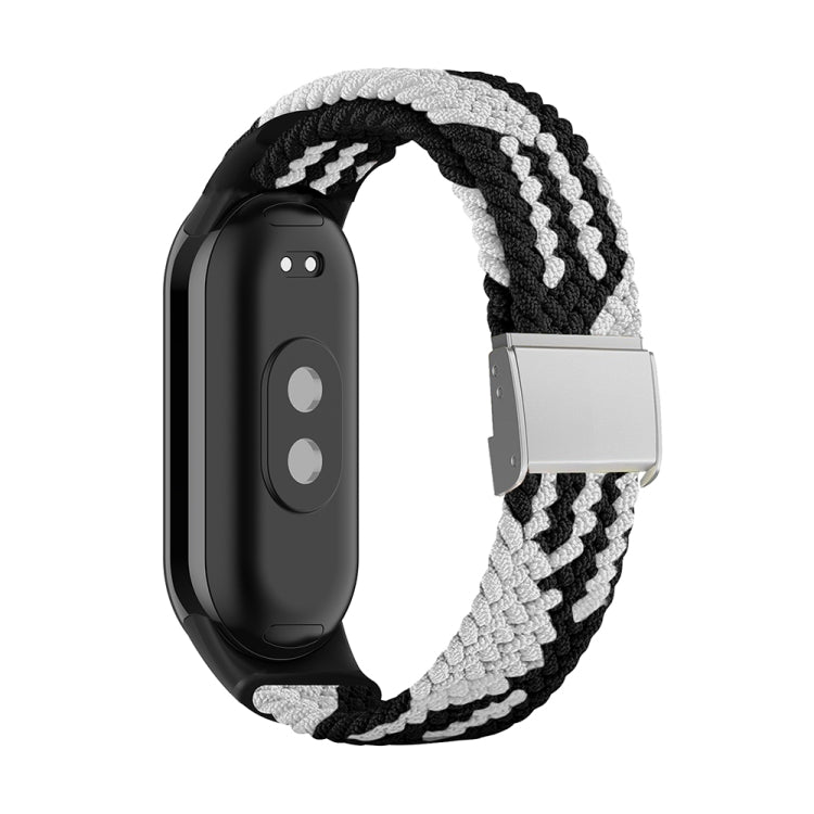 Black and white braided nylon watch band with adjustable steel buckle and silver clasp