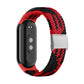 Red and black braided nylon watch band with adjustable steel buckle and silver clasp