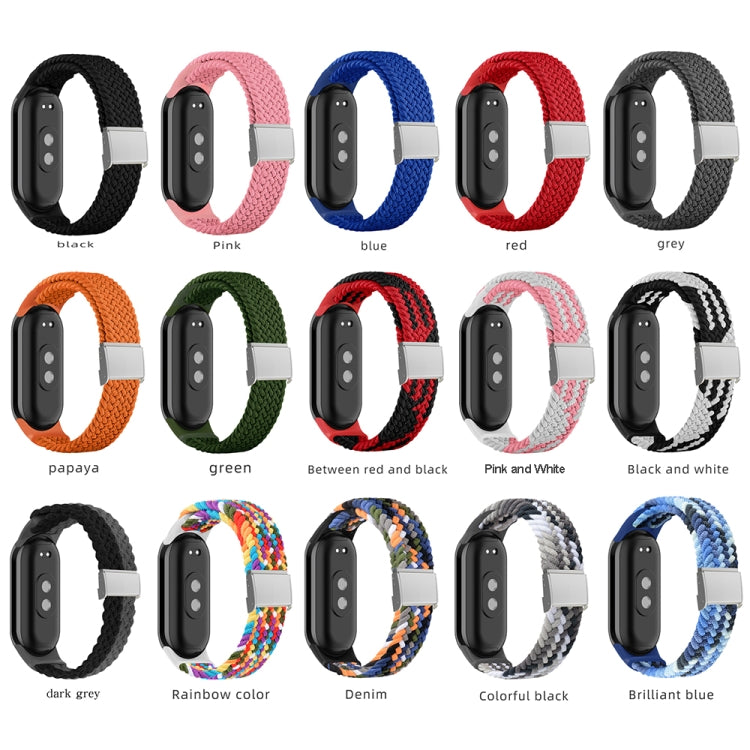 Assorted braided nylon watch bands with stainless steel buckles, multiple colors