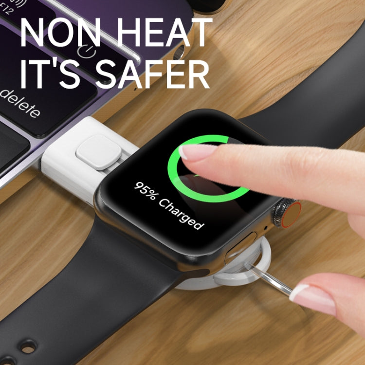 Black magnetic suction wireless charger with green charging progress ring