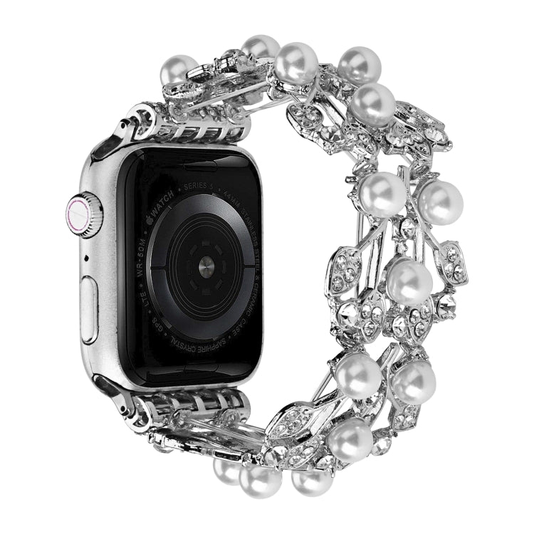 Four-leaf beaded metal watch band in silver with pearl beads on smartwatch