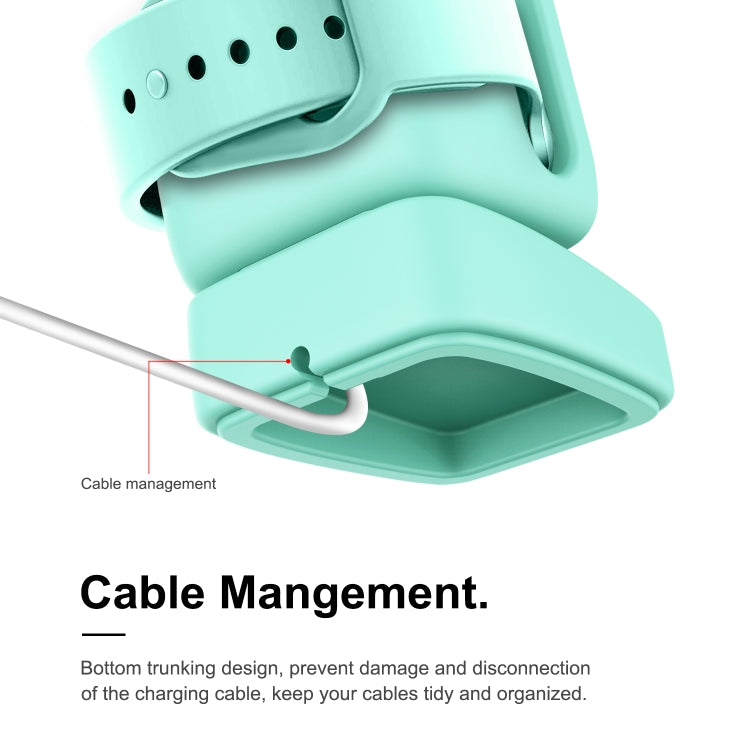 Mint green watch stand showing cable management holder and charging cradle