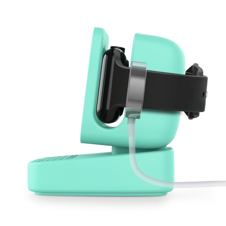 Mint green watch stand with cradle, smartwatch in slot, and charging cable