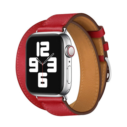 Red leather double loop watch strap with metal buckle and adjustment holes