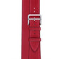 Red leather watch strap buckle with stitched edges and multiple adjustment holes