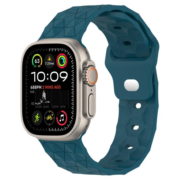 Silicone football-texture watch band in teal blue with perforated strap holes