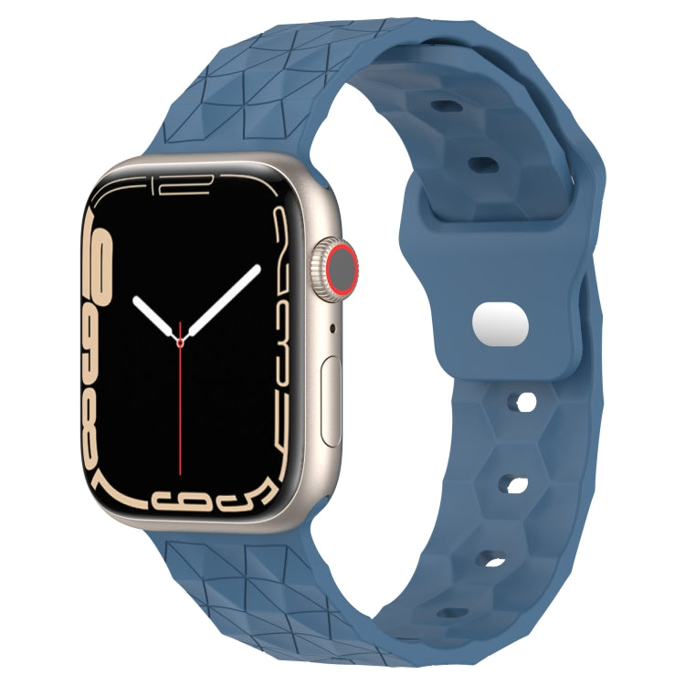 Silicone football-texture watch band in medium blue with perforated strap holes
