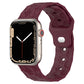 Wine red silicone watch band with football-textured geometric pattern and strap holes