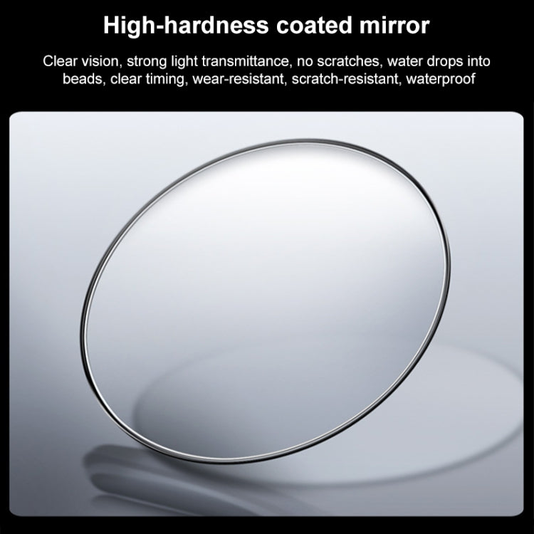 Quartz watch crystal close-up, round clear glass with thin metal bezel