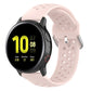 Light pink perforated silicone wrist strap with metal buckle and quick-release clasp
