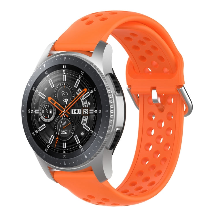 Orange silicone sport wrist strap with perforated holes and metal pin buckle