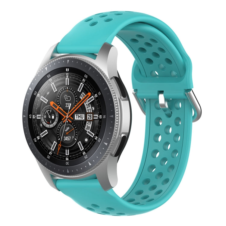 Teal silicone sport wrist strap with perforations and metal pin buckle