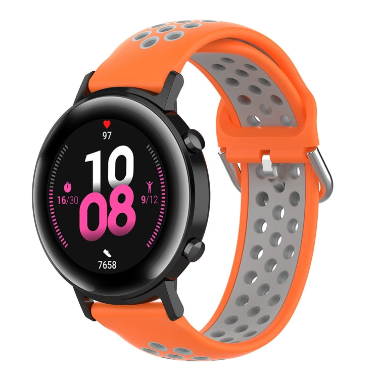 Silicone sports watch strap, orange and black perforated band with buckle