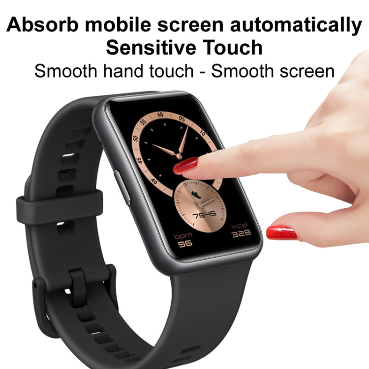 Watch screen protector film with fingertip touch over smartwatch display